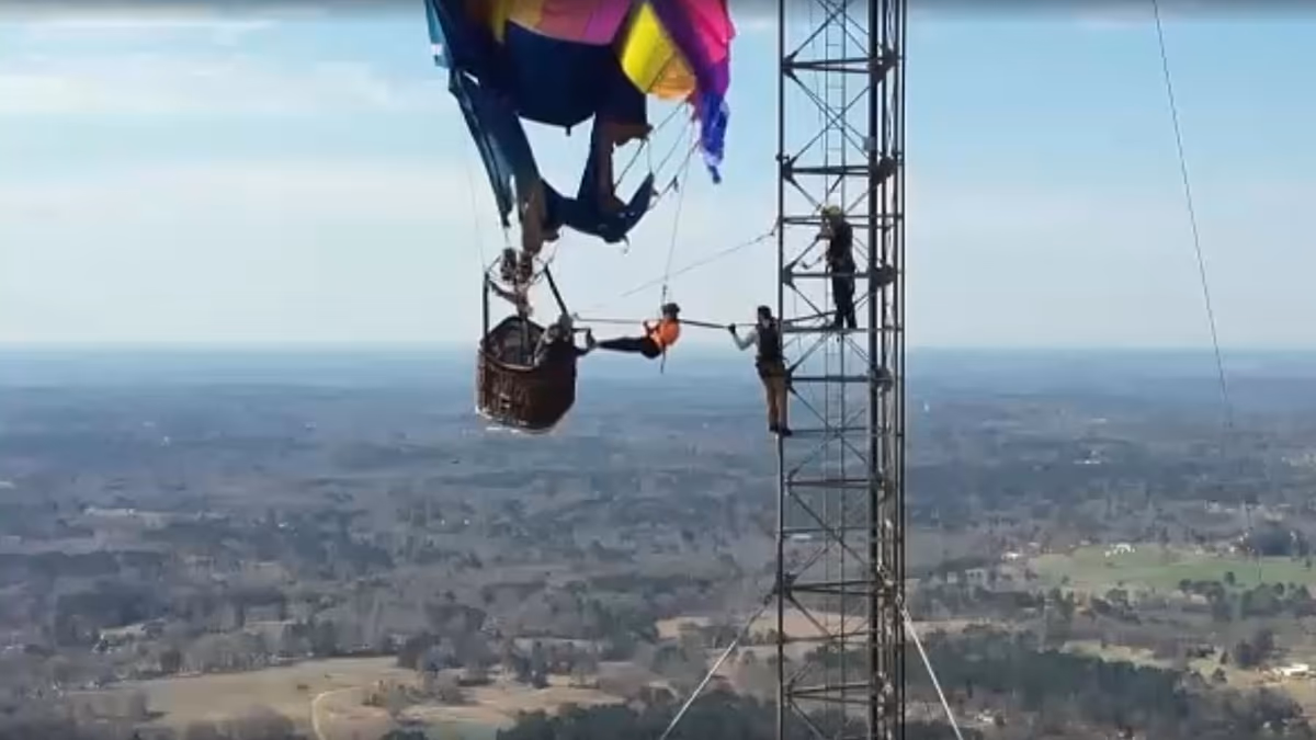 Video. Two rescued after hot-air balloon becomes stranded in the air on 274-metre