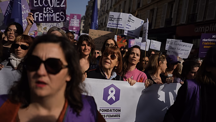 Thousands march in Paris for women’s rights, led by rape survivor Gisèle Pelicot