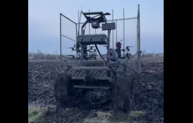 This new Ukrainian robot sneaks through ruins carrying drones in its belly, waits for Russian column, and strikes from bush