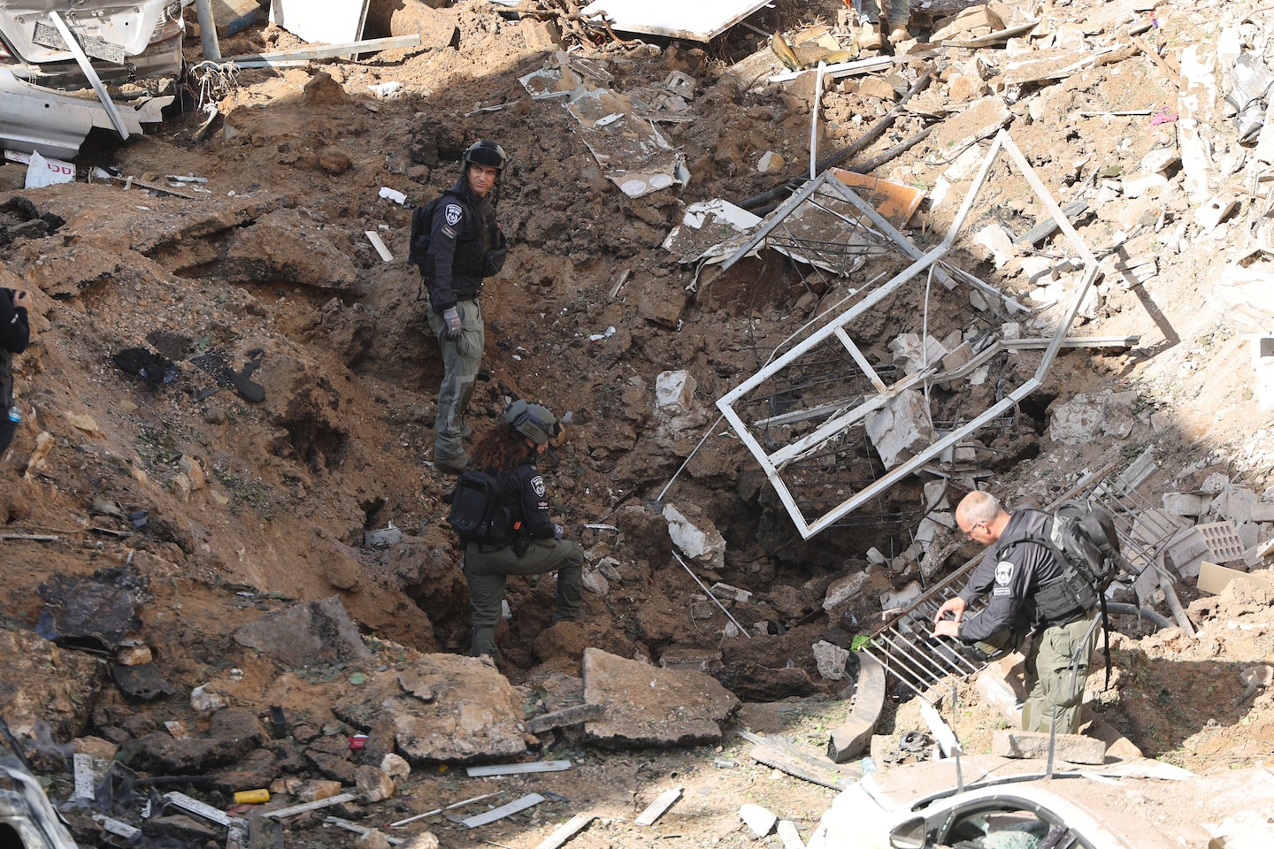 Israel and Iran exchange strikes as Trump says U.S. is negotiating end to war