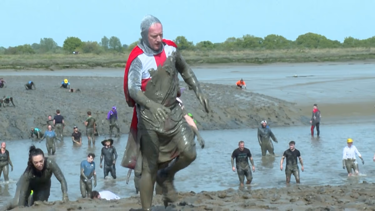 Video. Runners battle mud at annual UK charity race