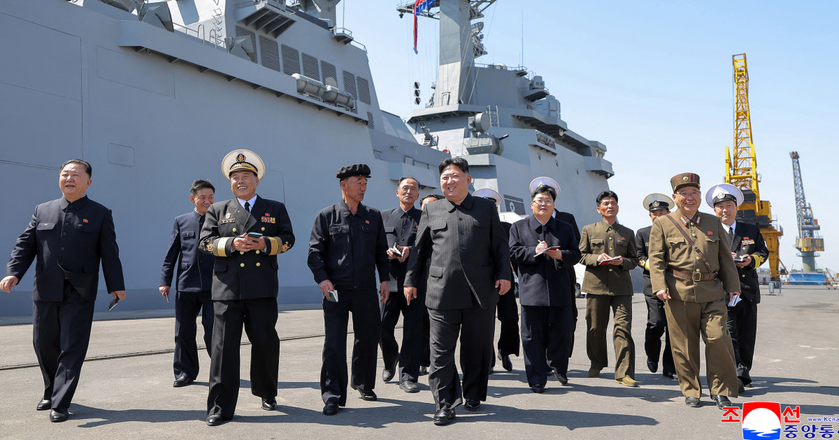 North Korea’s Kim Jong Un supervises missile tests from his naval destroyer