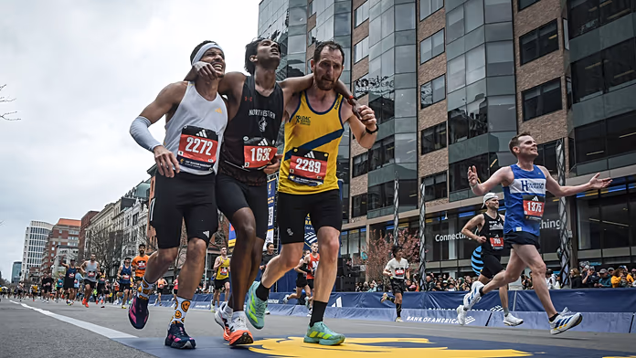 Two runners help collapsed competitor finish Boston Marathon