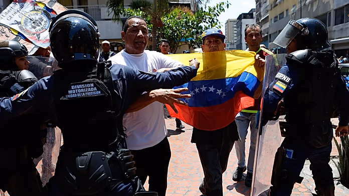 Venezuela police use tear gas against protesters demanding better pay and pensions