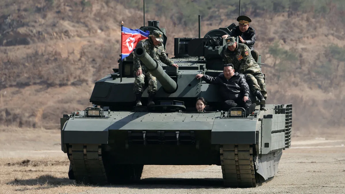 Photos of Kim Jong Un’s teen daughter driving a tank spark heir talk – USA Today