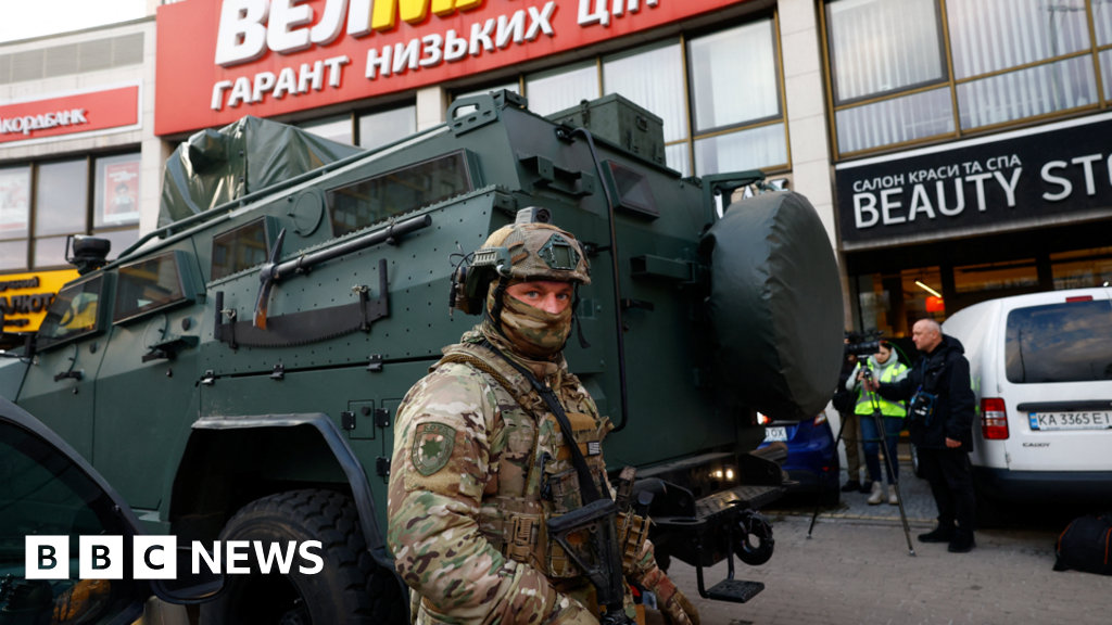 At least two dead as gunman opens fire and takes hostages in Kyiv – BBC