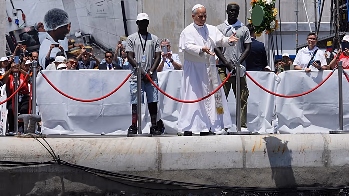 Pope Leo XIV casts wreath into sea in memory of migrants lost on Atlantic route